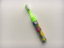 Tandborstepenna i blå, rosa och grön